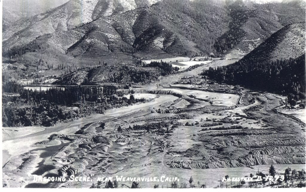 Mail tailings from dredger mining left along the Trinity River. 